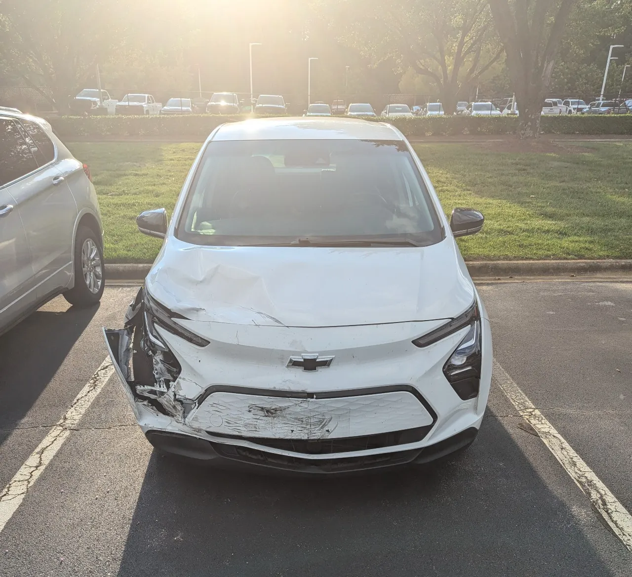 The same car, with the front right quarter smashed in
