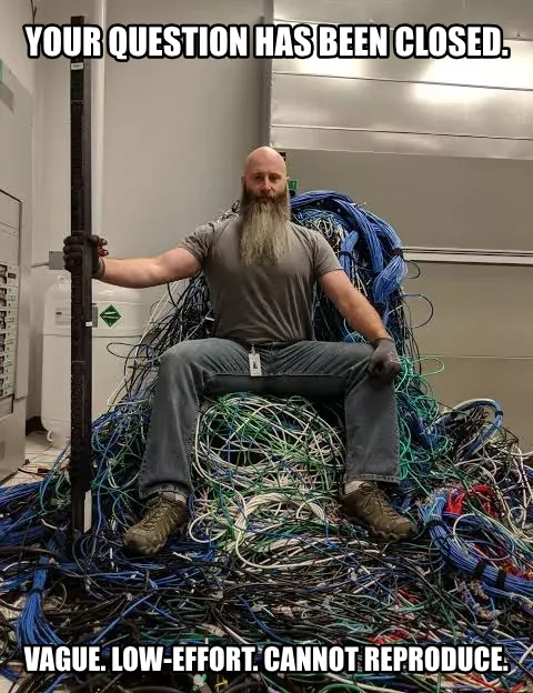 A programming wizard atop a throne of network cables. He intones 'Your question has been closed. Vague. Low-effort. Cannot reproduce.'